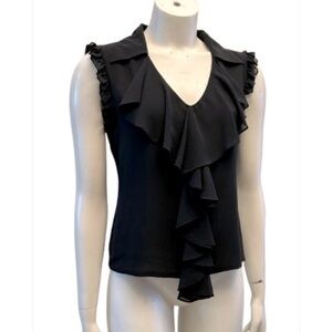 J.MICHAELS black sleeveless ruffle top in new condition. Pit to pit-19”.